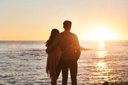 Romantic partners on a beach