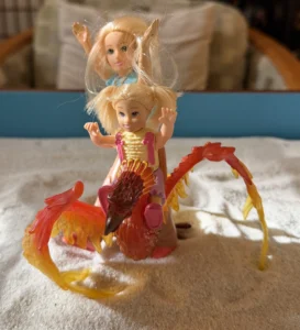 Woman and girl riding dragon